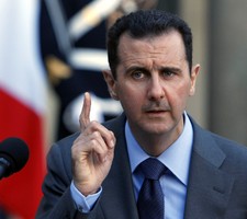 Assad diz que ameaça de ataques se baseia 